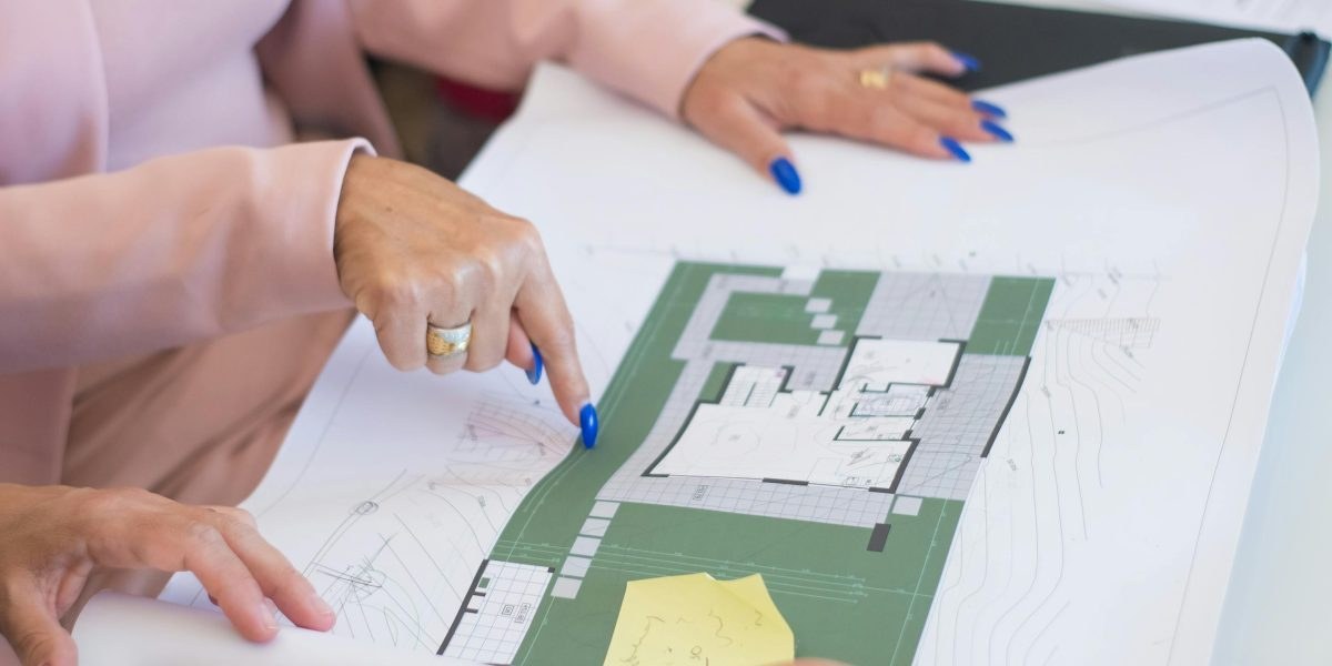 Close-up of property documents and floor plans