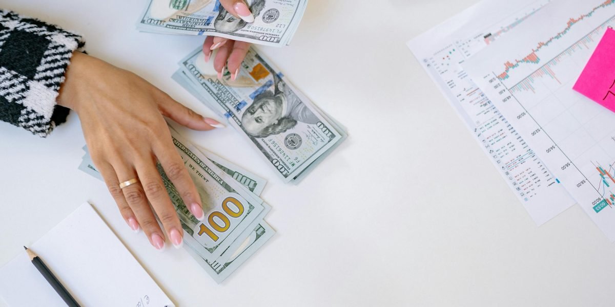 An entrepreneur thoughtfully reviewing documents, symbolizing the vast opportunities in Dubai's commercial real estate market.