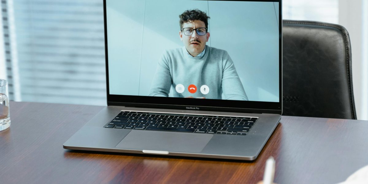 An international property owner collaborating with their UK-based letting agent or property manager using video conferencing.