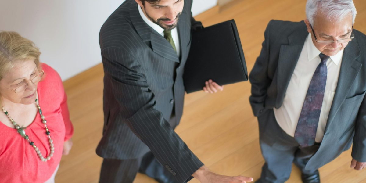 A client consulting with a real estate agent, discussing property options and market insights.