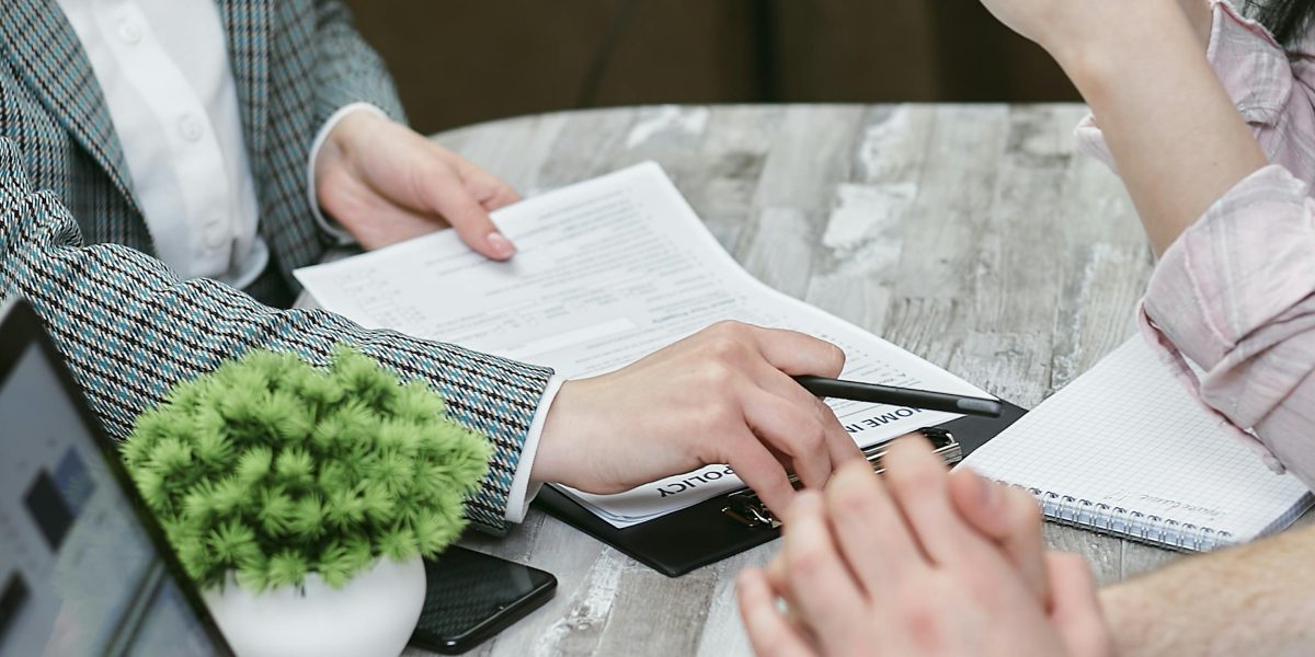 A consultant explaining market trends and investment opportunities to a client.