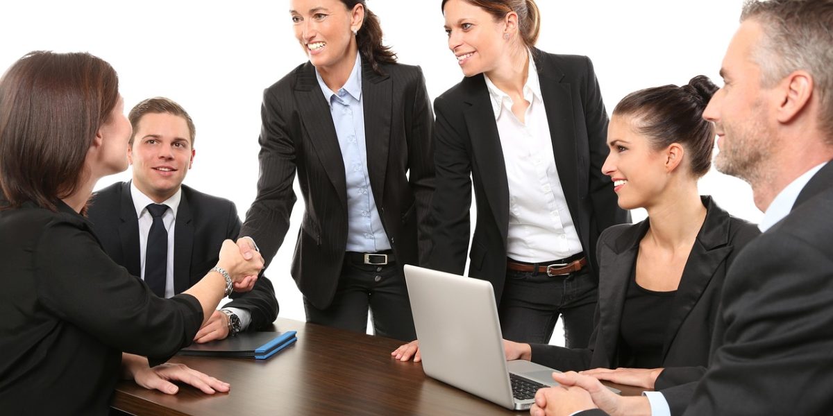 Business leaders actively plan and strategize to secure optimal commercial locations in a competitive market.