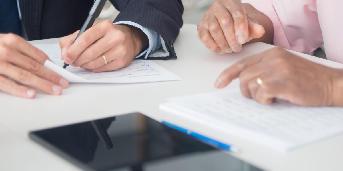 Buyers, sellers, or investors discussing terms and negotiating real estate agent commissions in Dubai.
