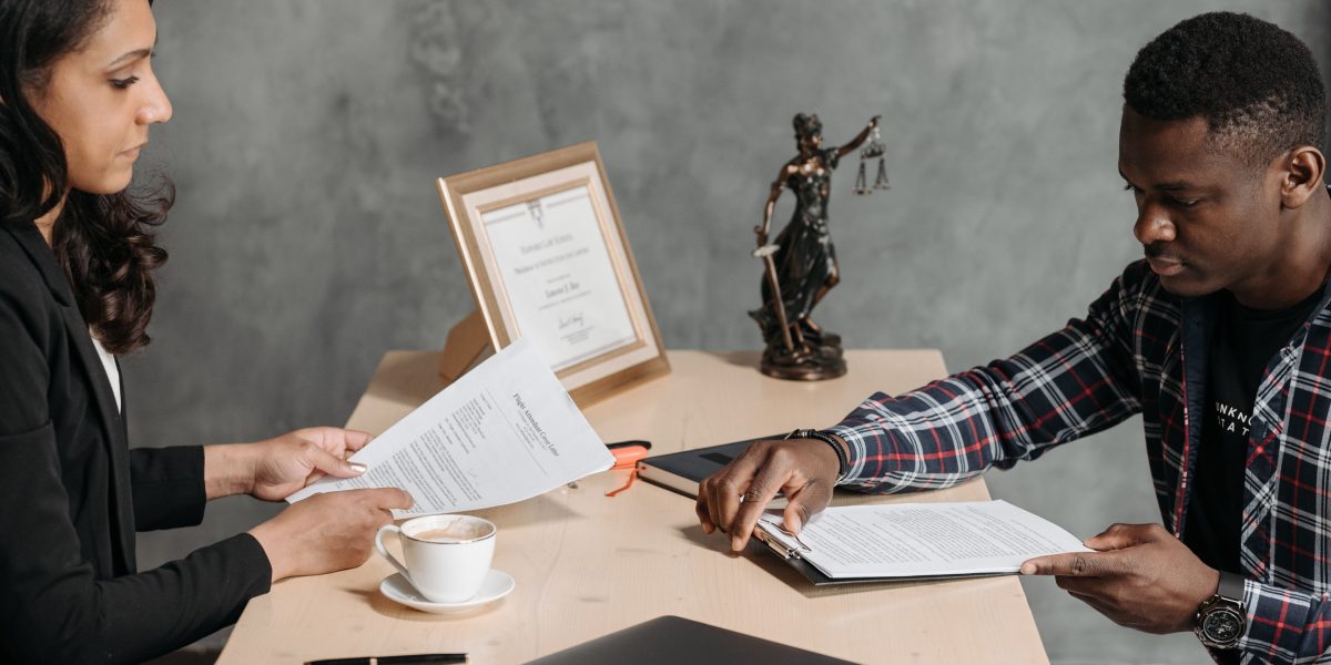 A legal advisor in a professional setting, explaining details to a client, emphasizing the value of expert guidance in commercial leasing.