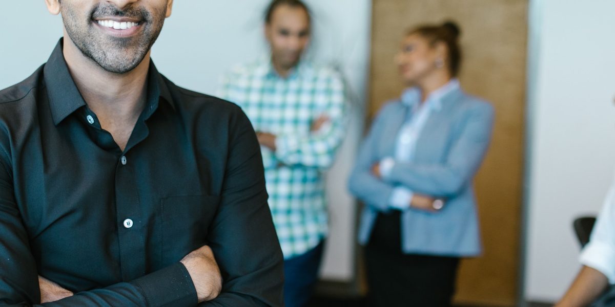 A business professional looks confident and relieved after a successful financing meeting.