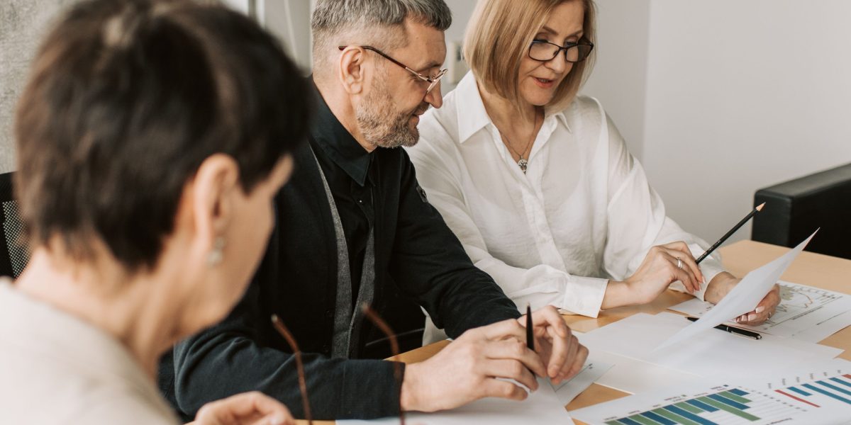 A team of professionals collaborates on comprehensive due diligence for a commercial property.