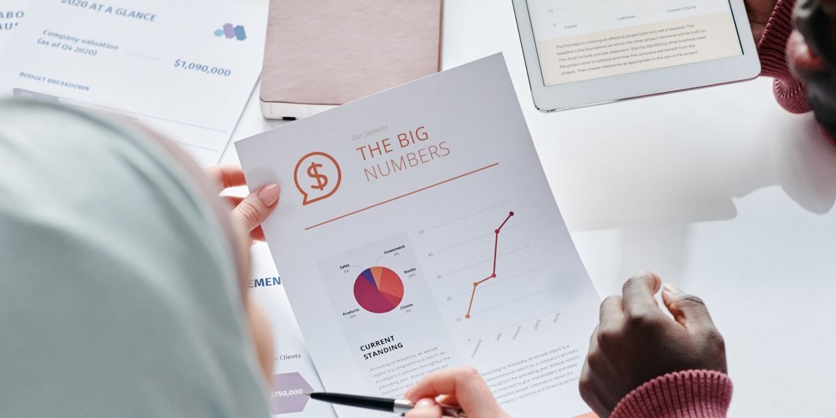Professionals collaborate to define clear investment goals and strategies for property acquisition.