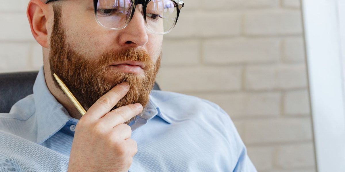 An individual contemplates future options, carefully planning the exit strategy for their property investment.