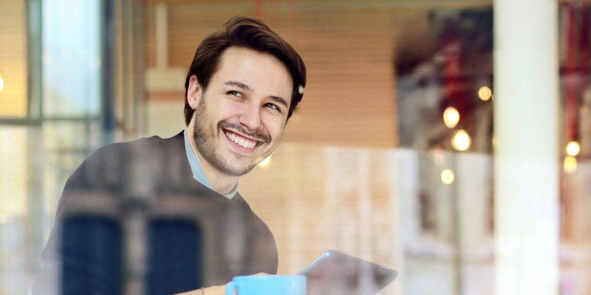 A person diligently using online tools and filters to find the ideal warehouse property in Dubai.